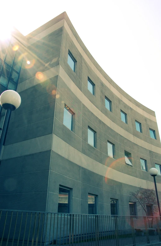 a side view of a building with some big windows