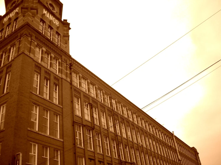 an image of an old building with a clock tower