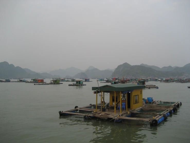 several boats are traveling on the water in open waters