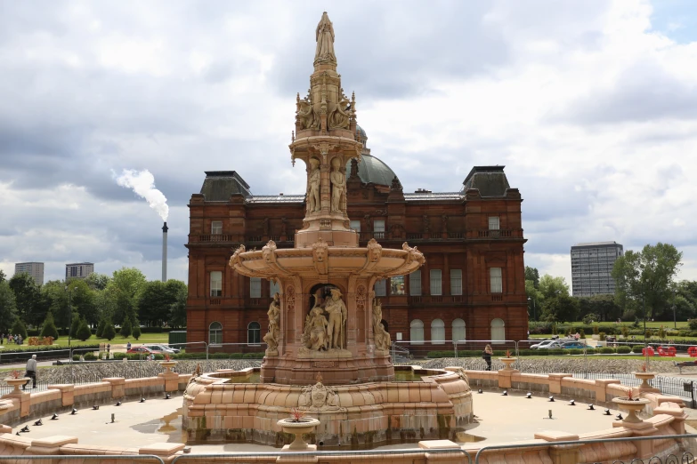 large building with fountain in the center of it