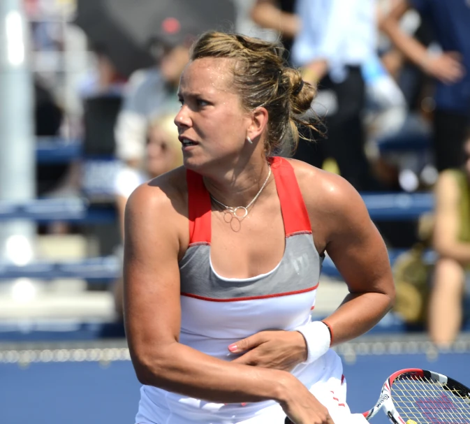 a tennis player is having just returned the ball