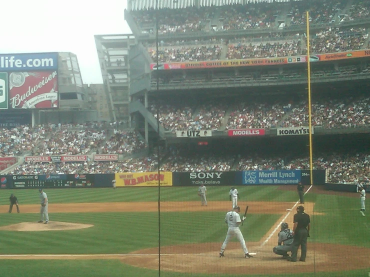 the baseball player is getting ready to hit the ball