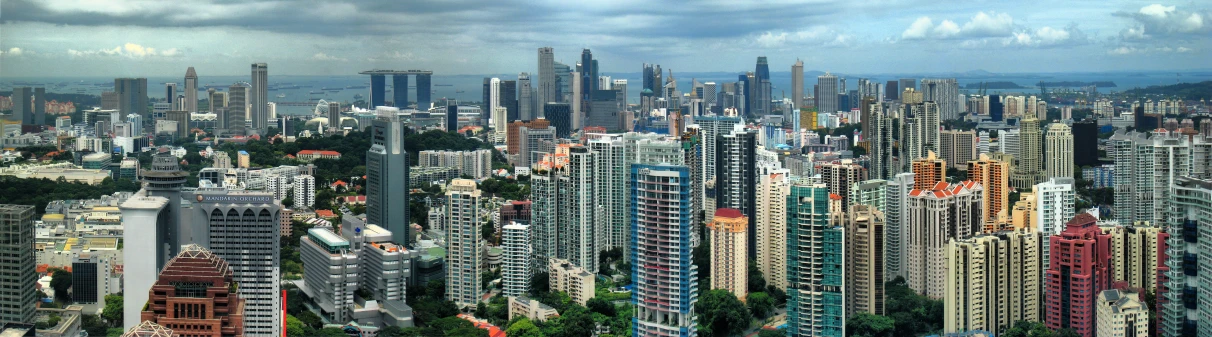 a tall city in asia with very colorful buildings