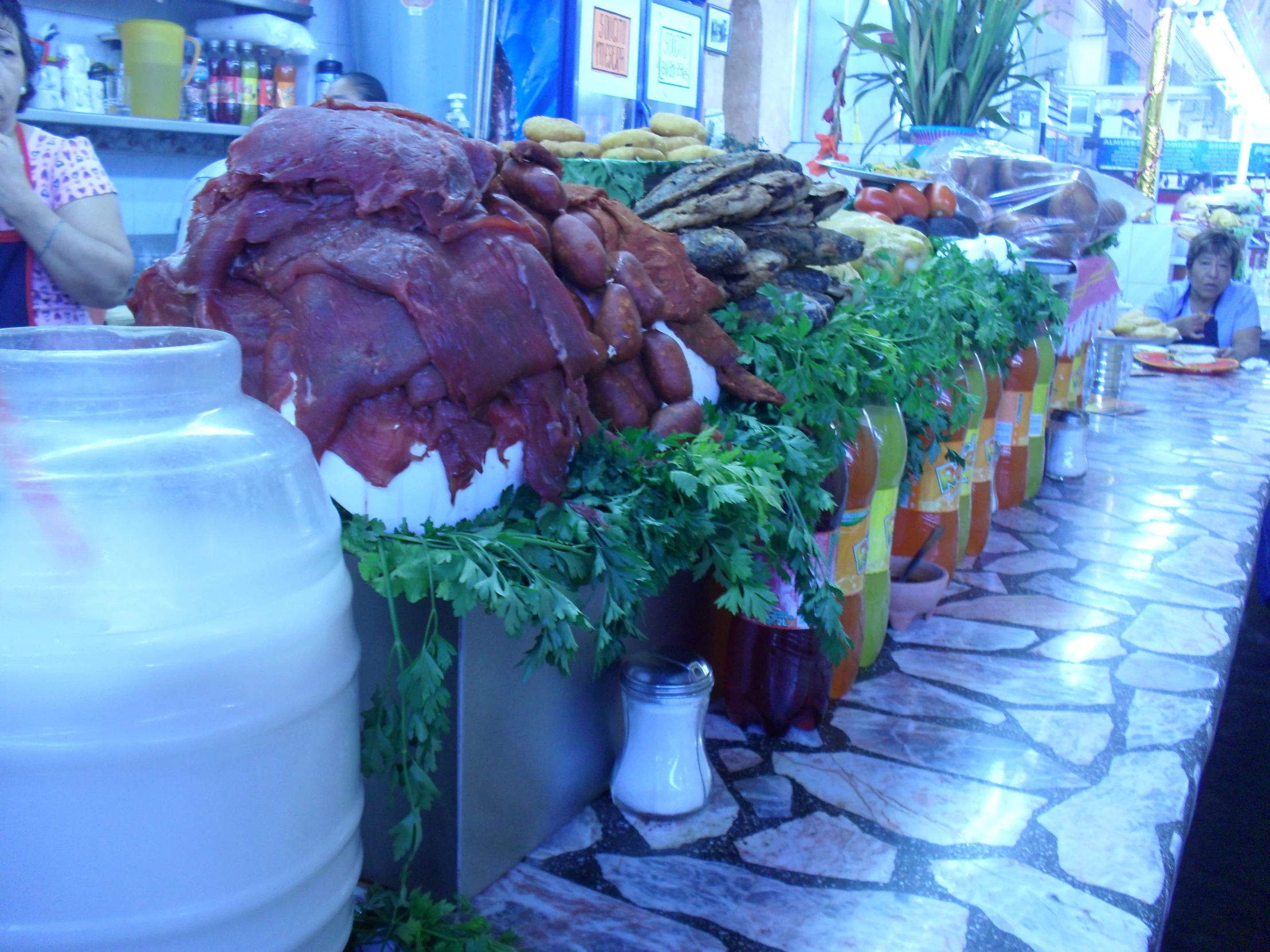 many different types of meat sit on display