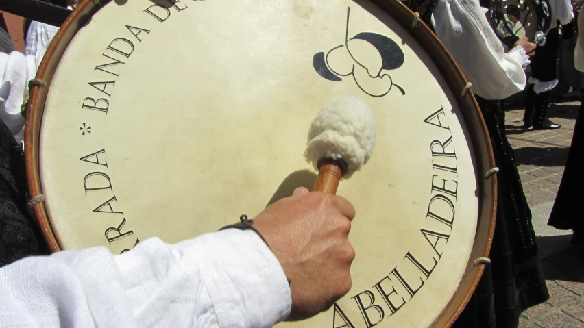 a drum player is playing the traditional instrument