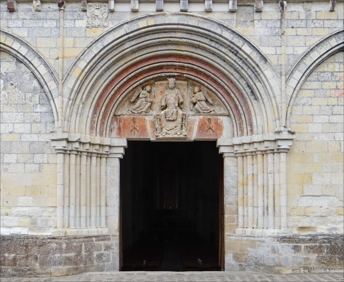 a large door on a building near the brick