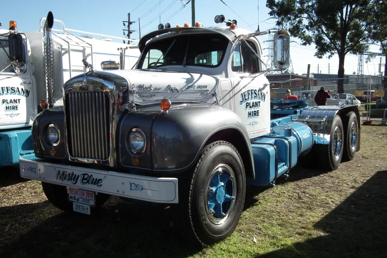 the truck is painted silver and blue