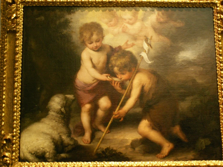 a painting in gold frames with angels and boys