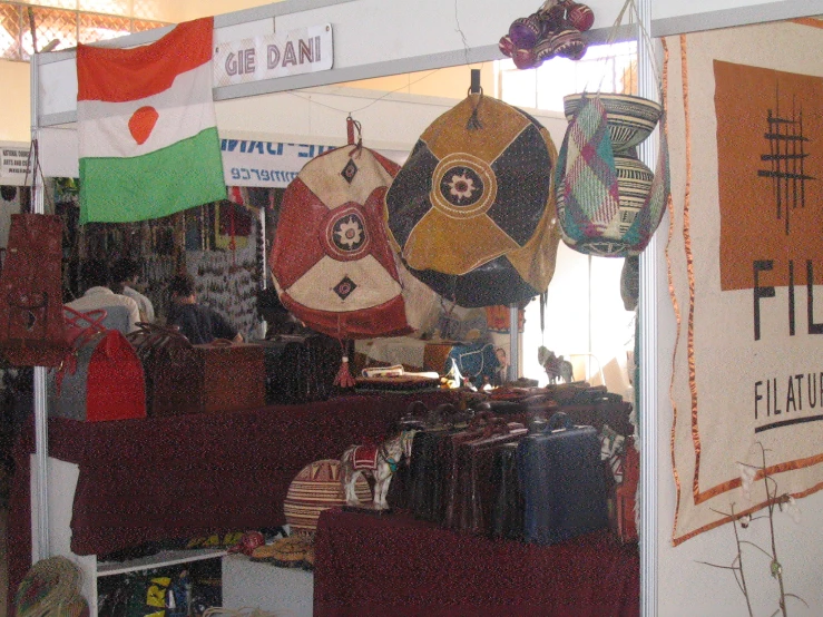 a very big store with several flags hanging from it's ceiling