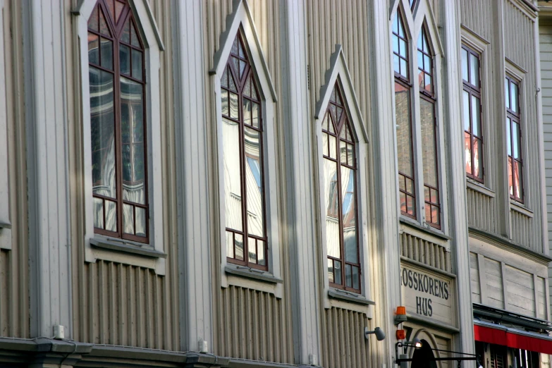 the building has many windows reflecting light