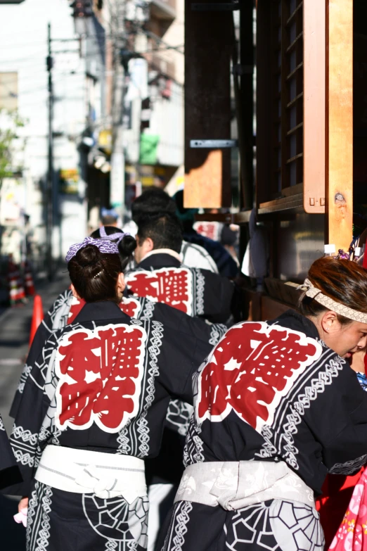 group of japanese people dressed in traditional clothes