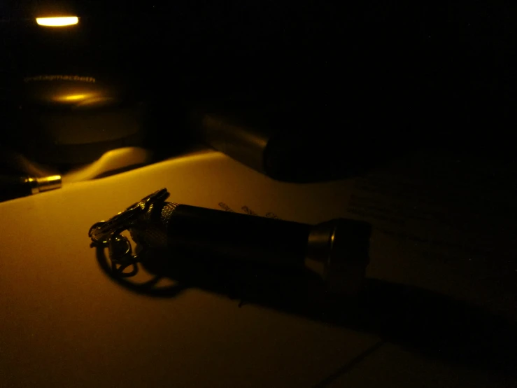 a flashlight is being used to illuminate darkness