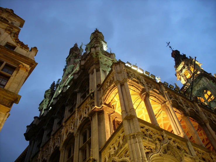 a tower that has a lit clock at the top