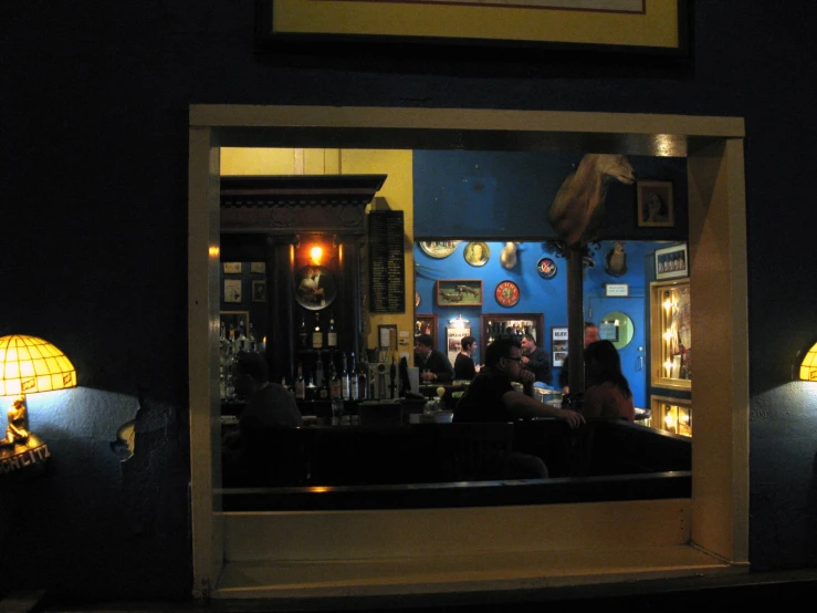 the bar is lighted up in blue lights