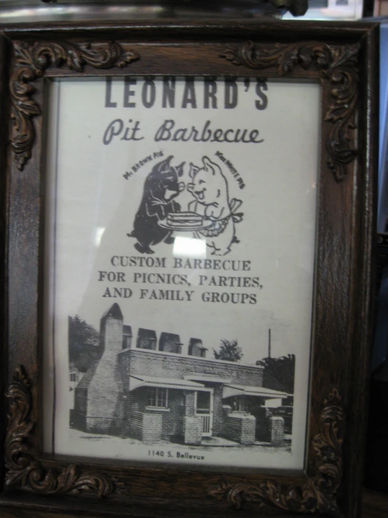 the sign in the frame reads, leonard's pit barbecue