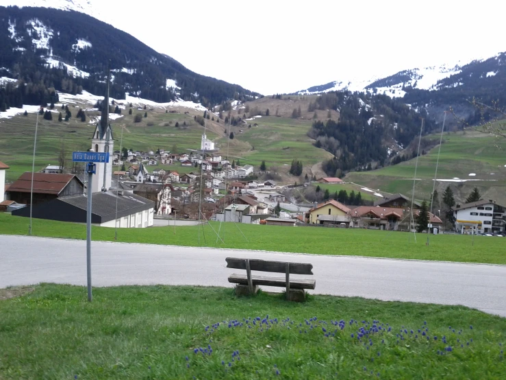 an image of a mountain town in the distance