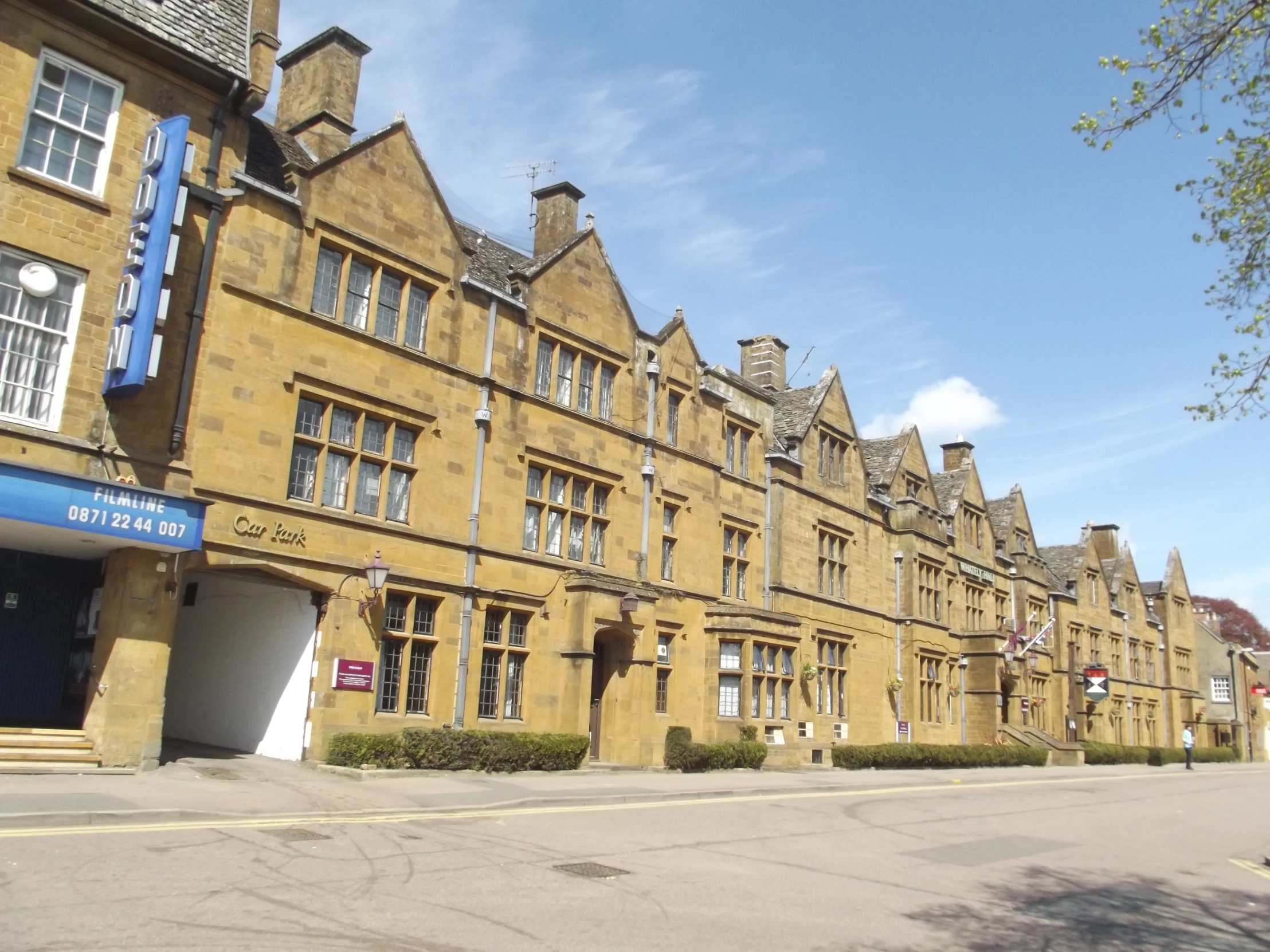 this old yellow brick building is now part of a college