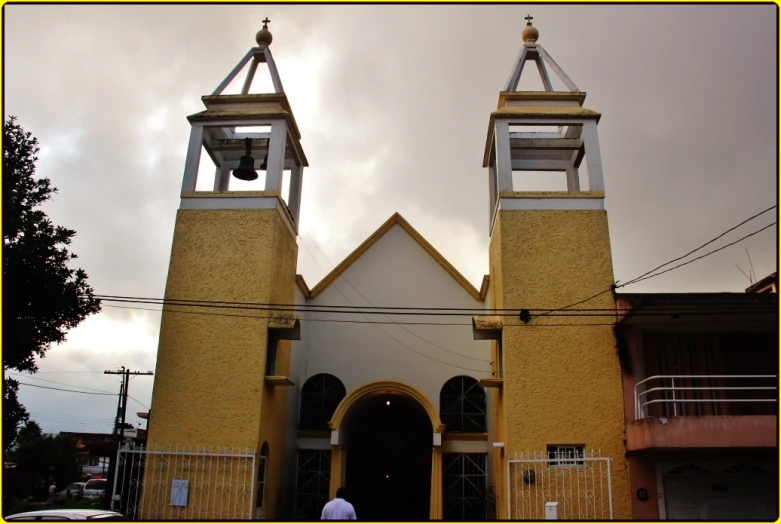 an old church is surrounded by many power lines