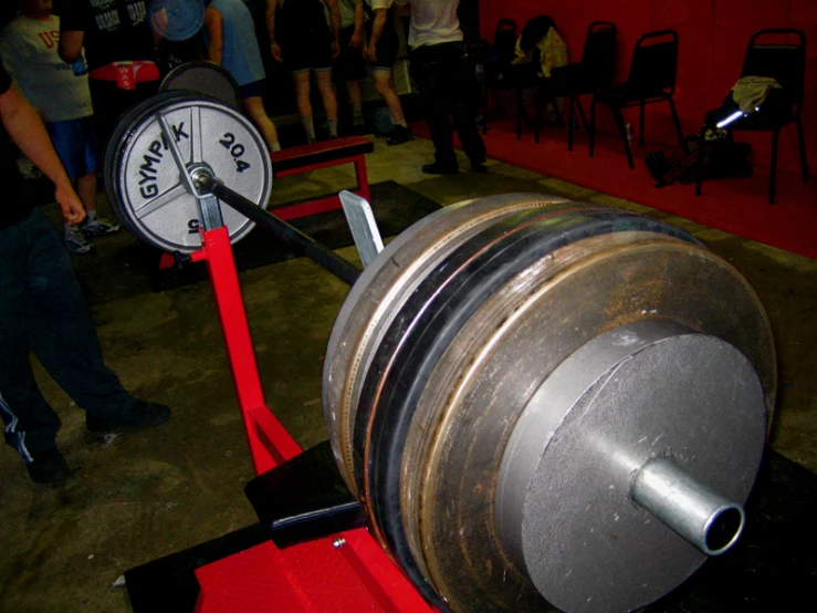 a gym with many people in the background