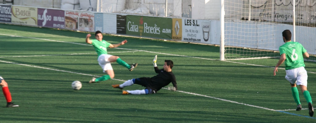 there is a soccer game that has some players on it