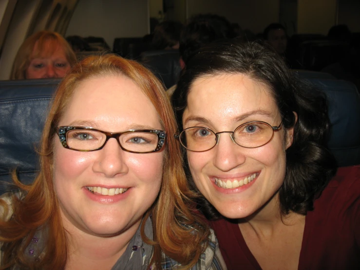 a couple of women standing next to each other