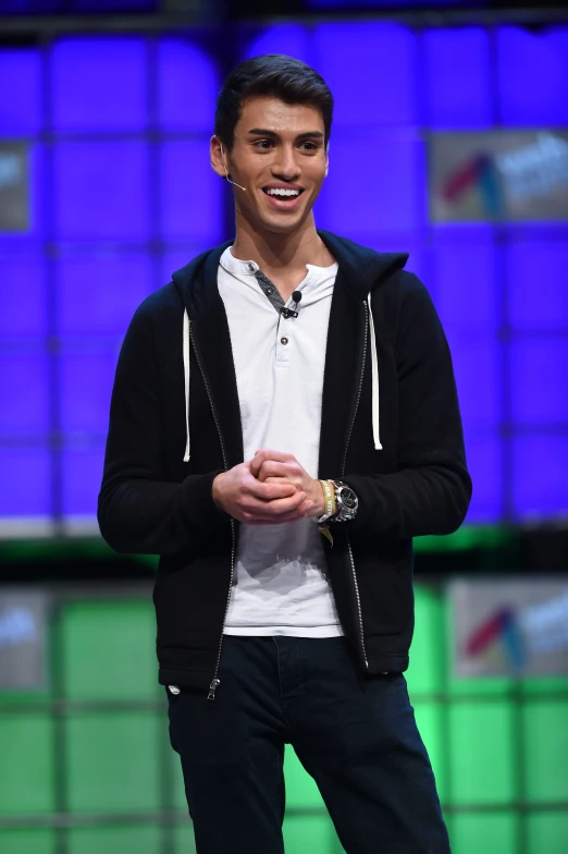 a man in a white shirt and black jacket