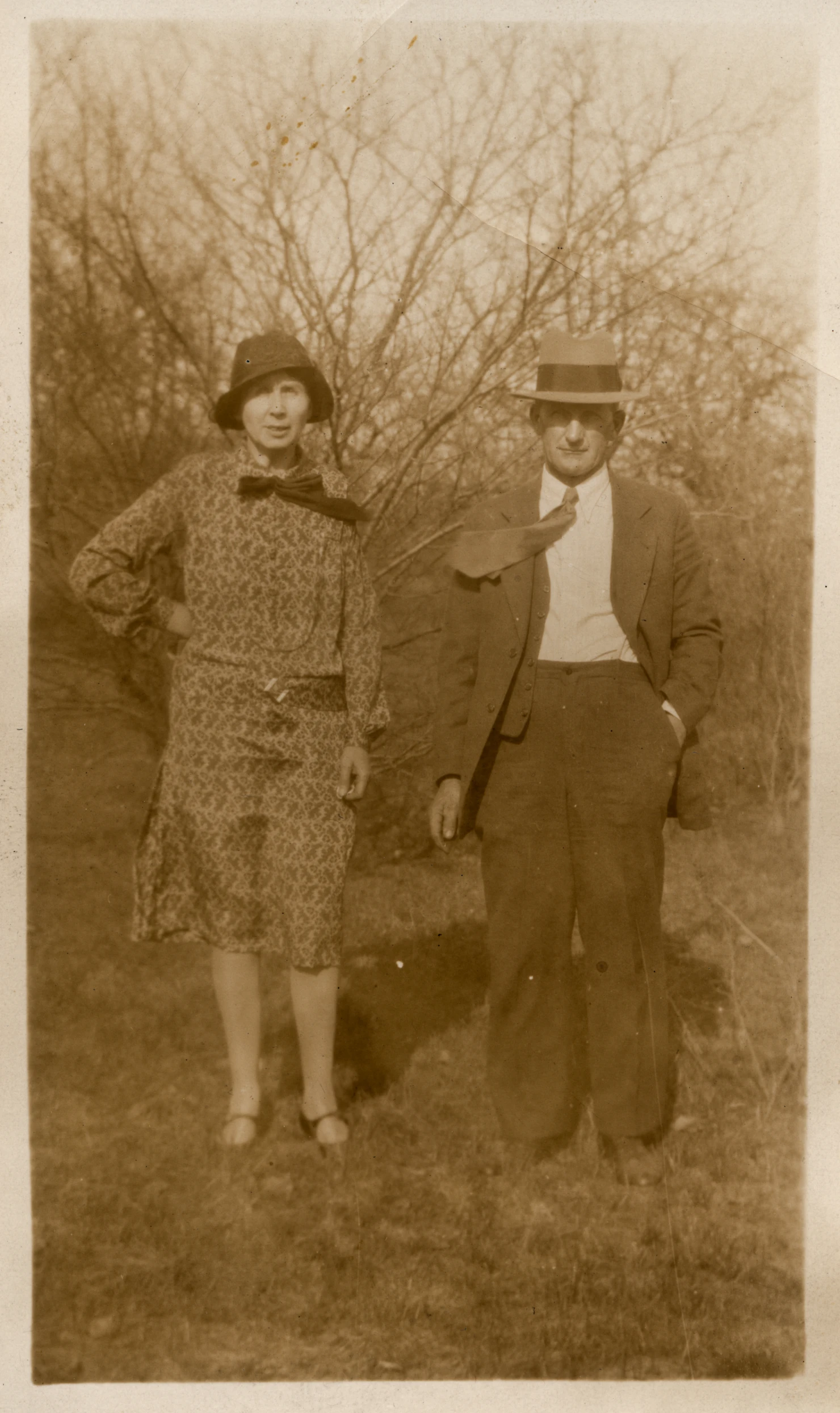 an old po of two people standing side by side