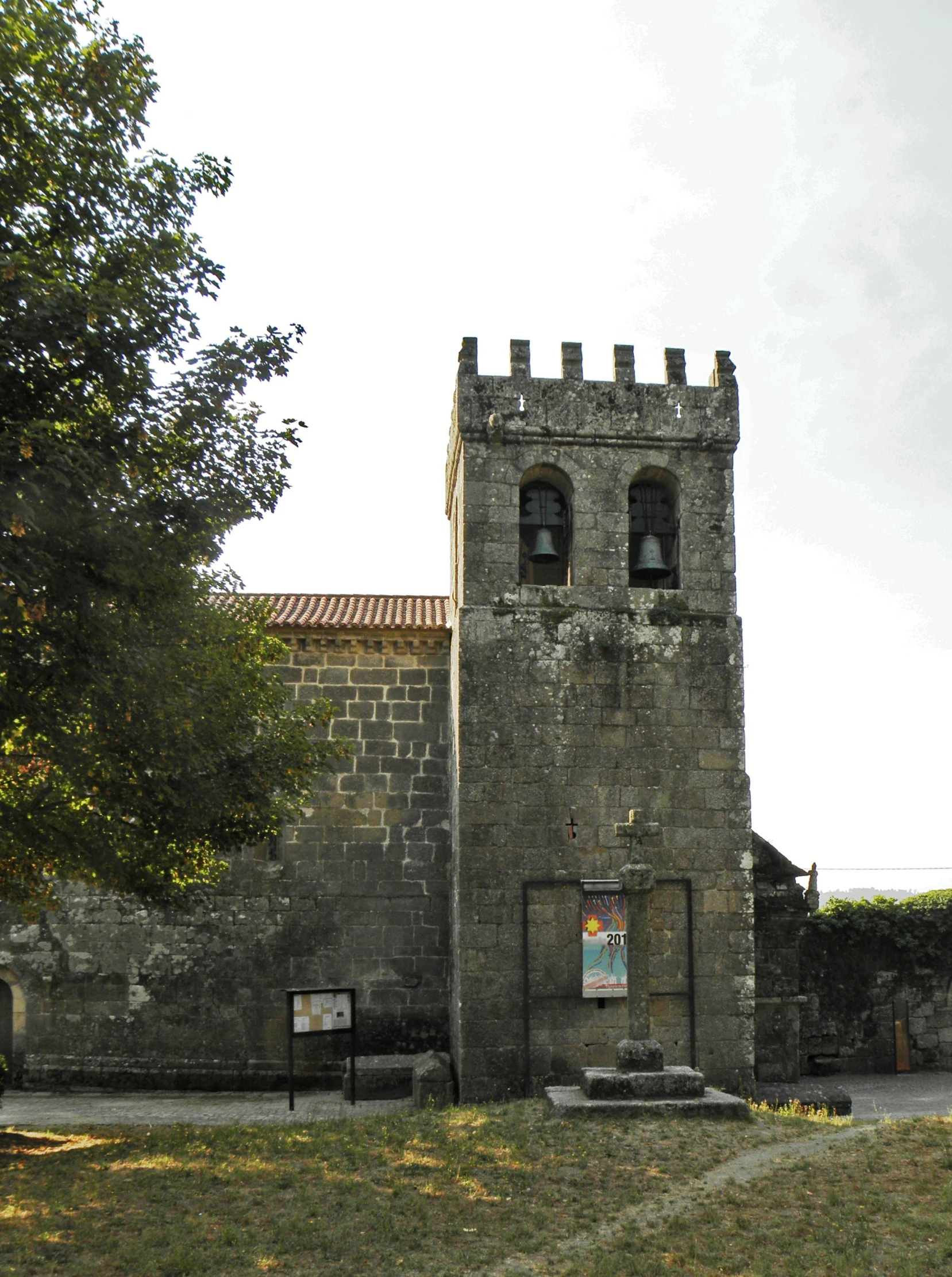 there is a small building with two bells