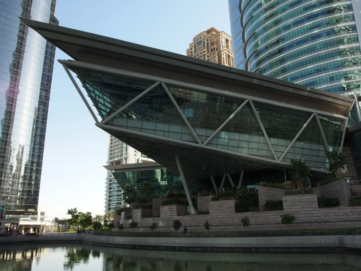 modern architecture is seen near the tall buildings