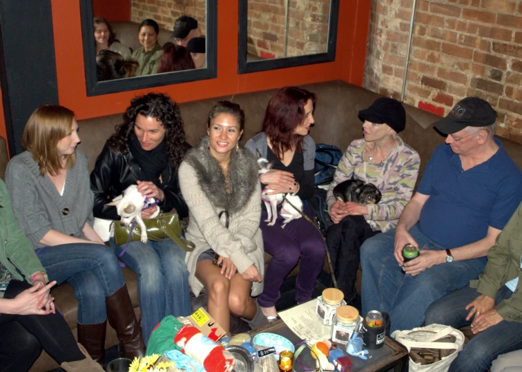 a group of people sitting on couches together