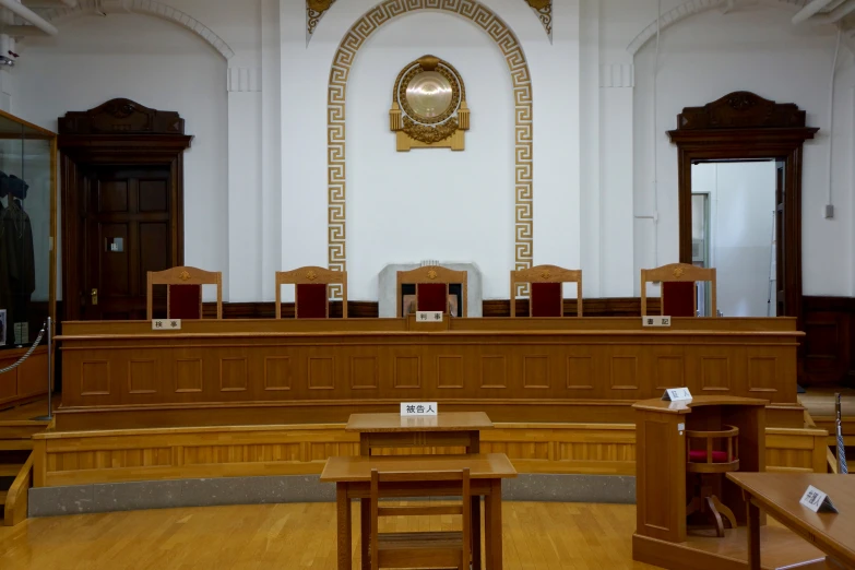 a room filled with wooden chairs and tables