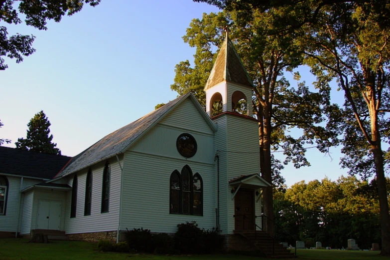 a large white church with a steeple on the front