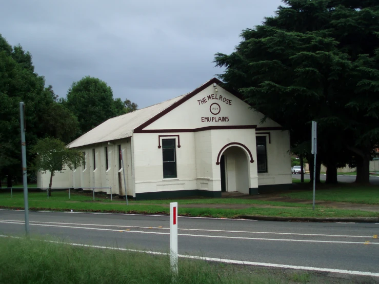 an old church sits along the road