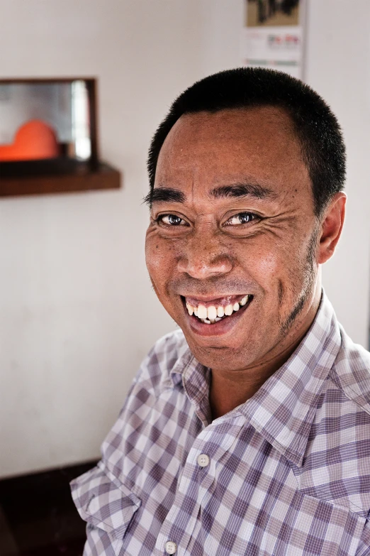 a close up of a person with a smiling face