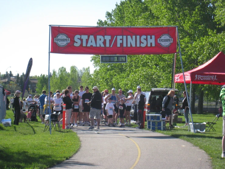 many people stand in line to enter a start