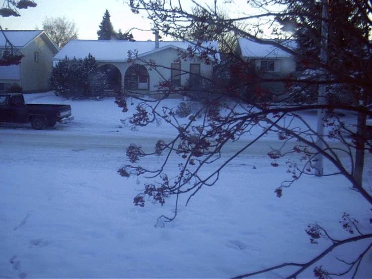 a very big pretty house in the winter