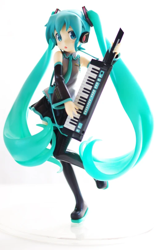 figurine wearing headphones and carrying piano instrument