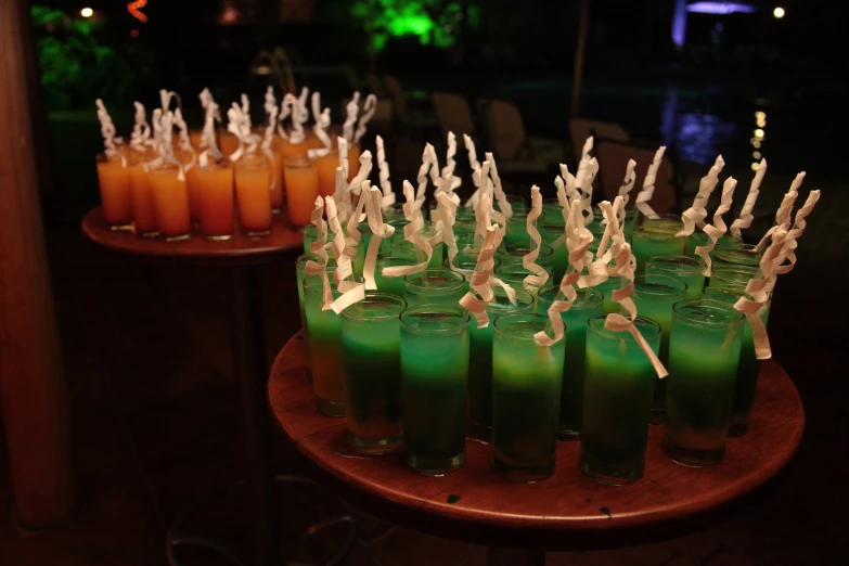 several cocktails on display on a small tray