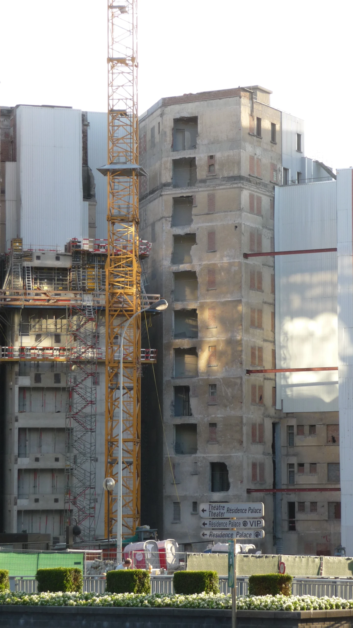 an unfinished building is seen on a sunny day