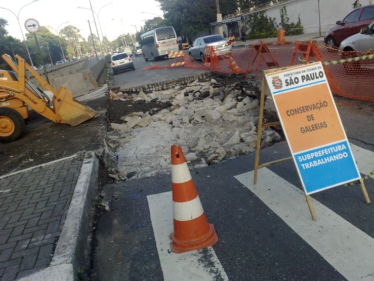 construction signs on the corner of the street