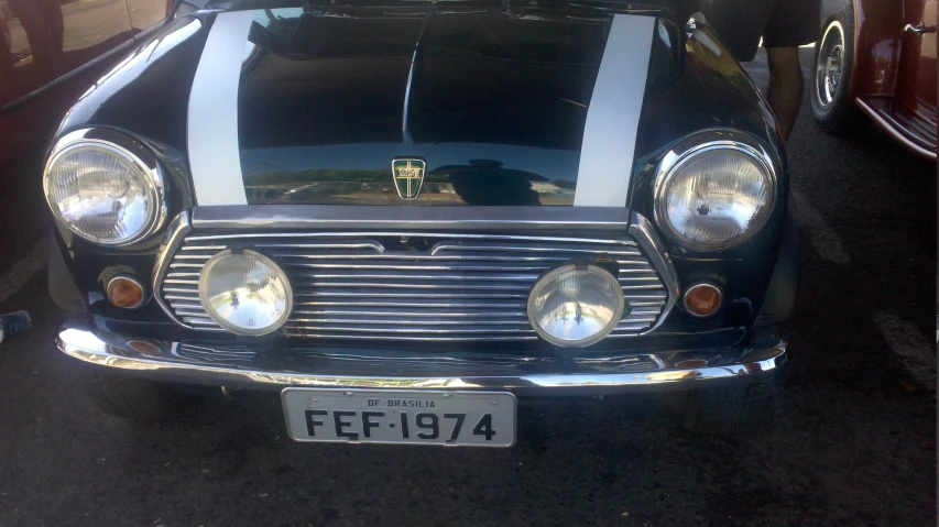 an old car sits outside a business center