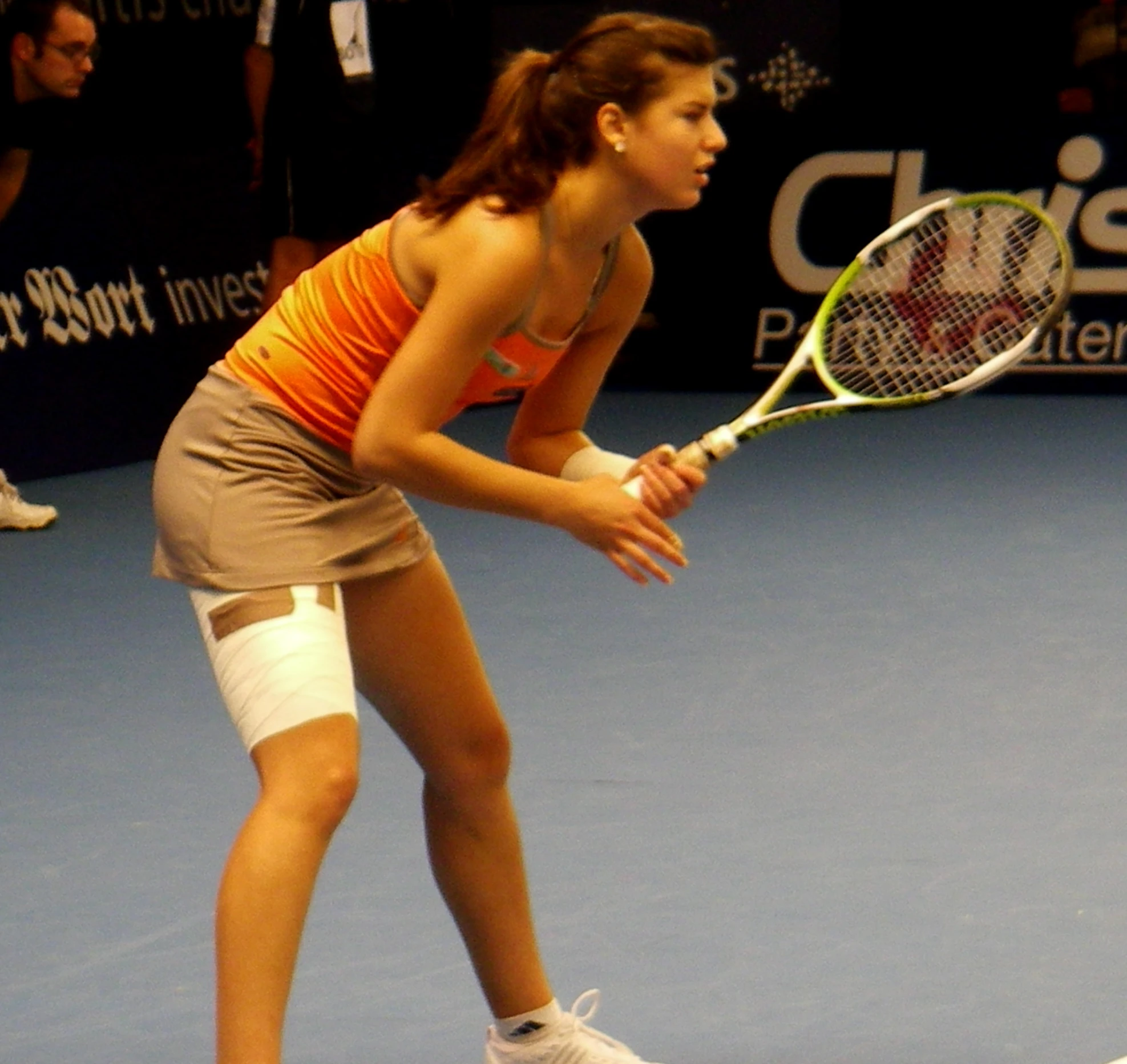 a tennis player prepares to hit the ball