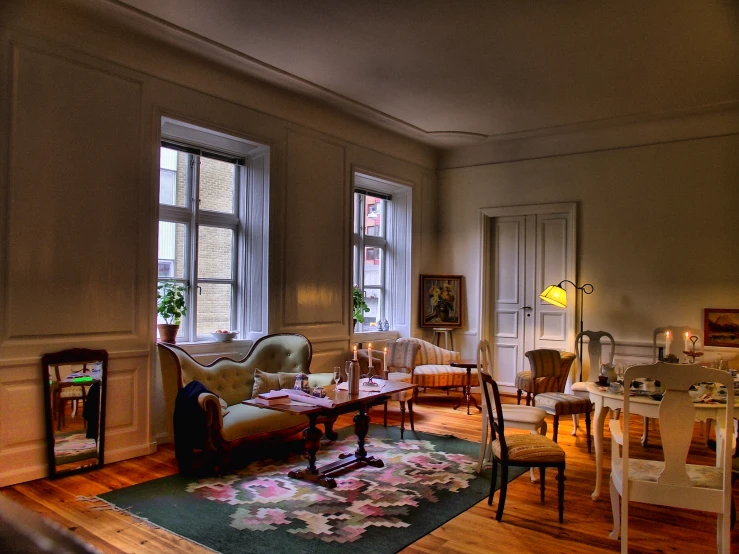 an old living room is decorated with antique furniture and art deco