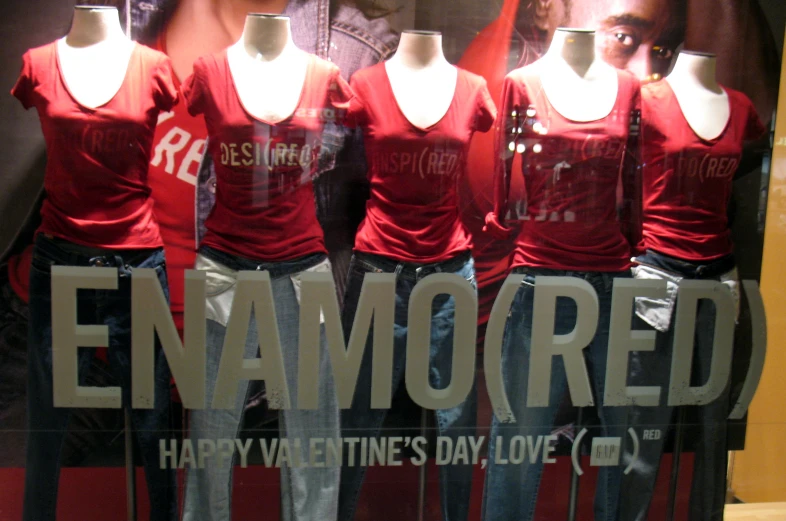 a group of mannequins with shirts reading ` engaged '