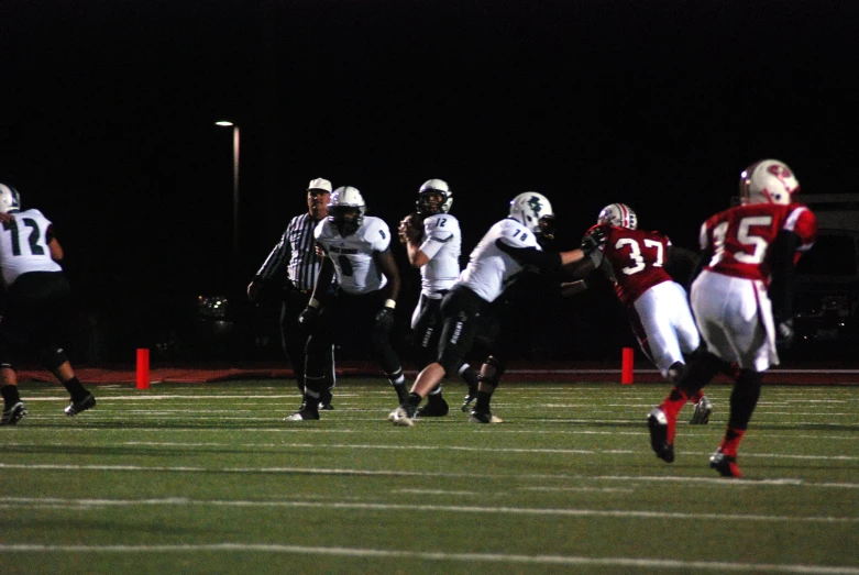 a football player is running the ball