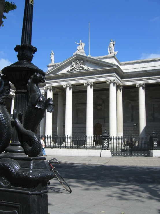 a street light and a building with columns