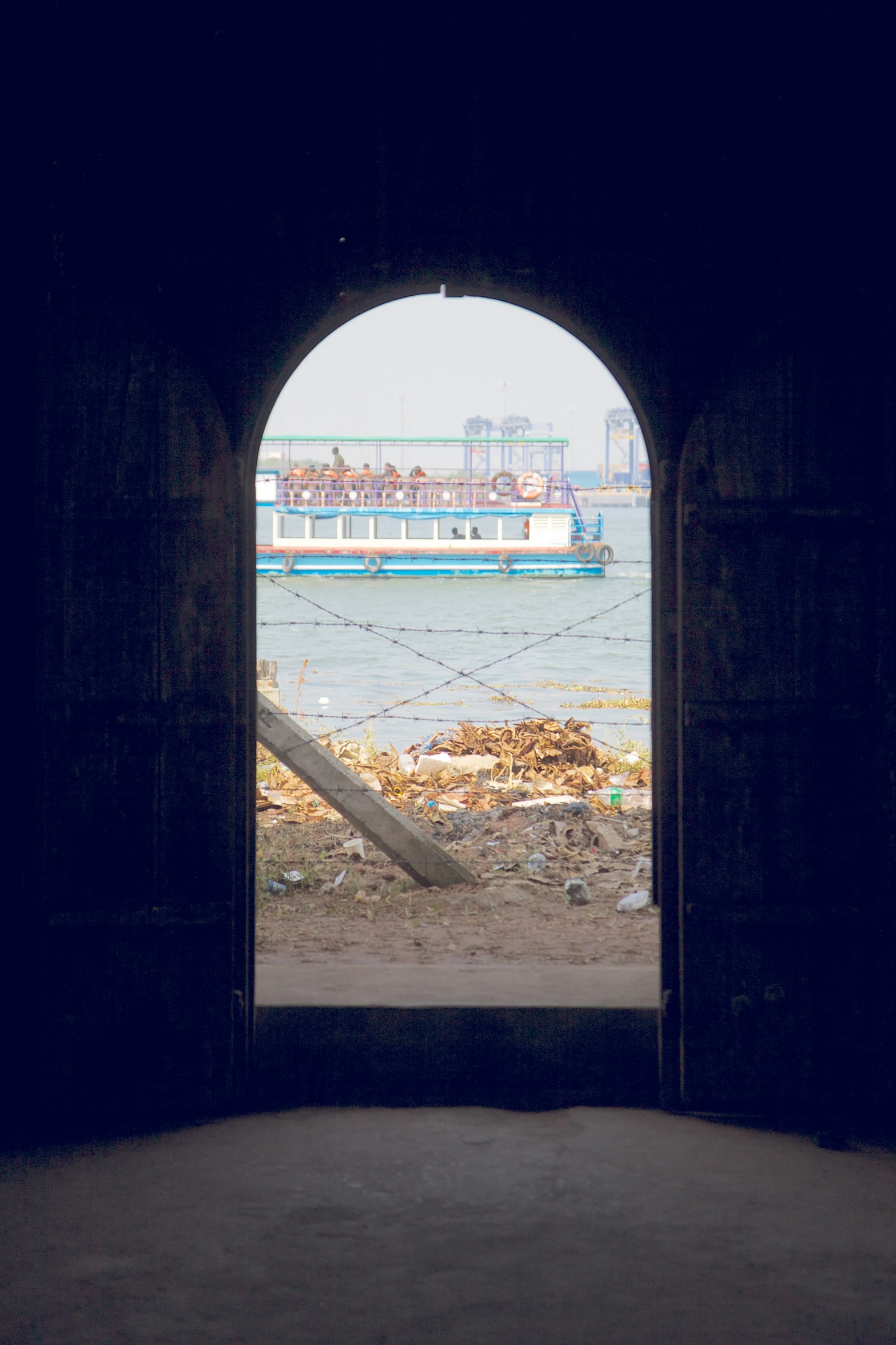 a blue and white boat in the water