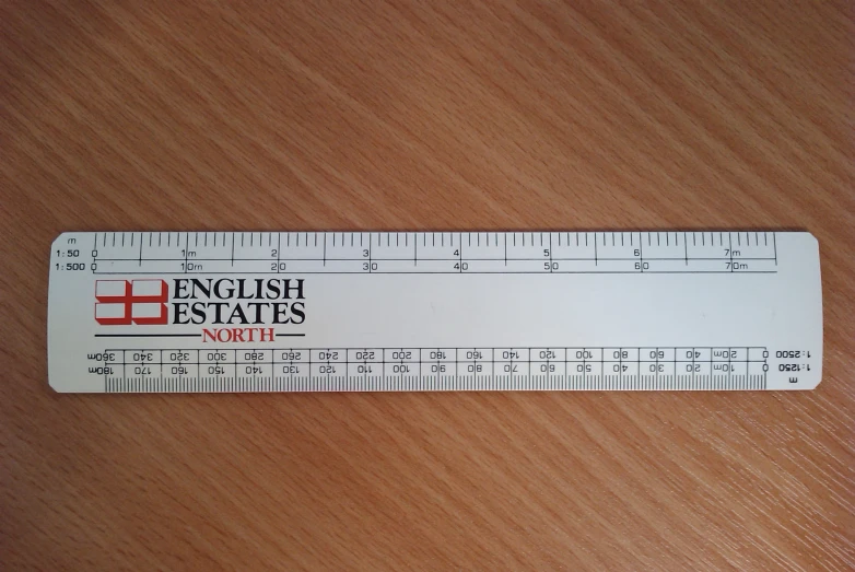 a white ruler that is on top of a table