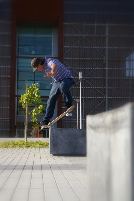 a man jumping in the air on a skateboard