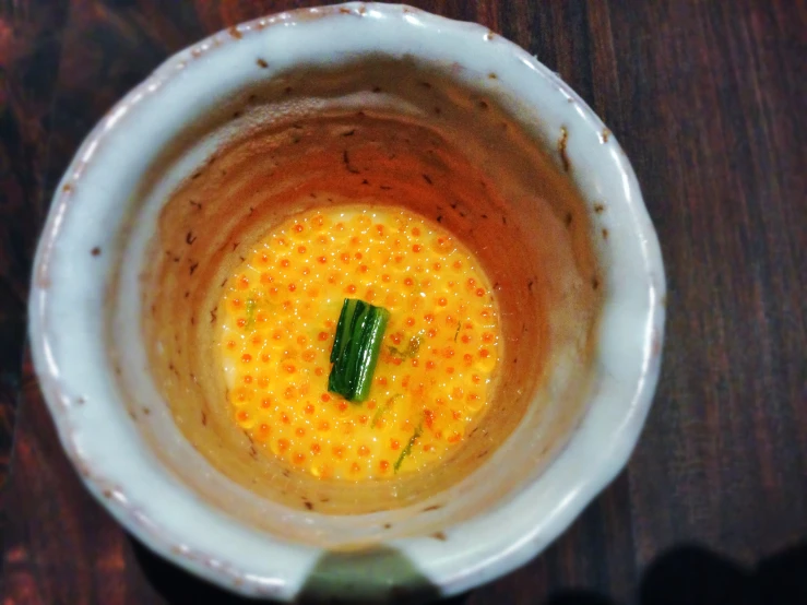 the soup is in a bowl with a garnish